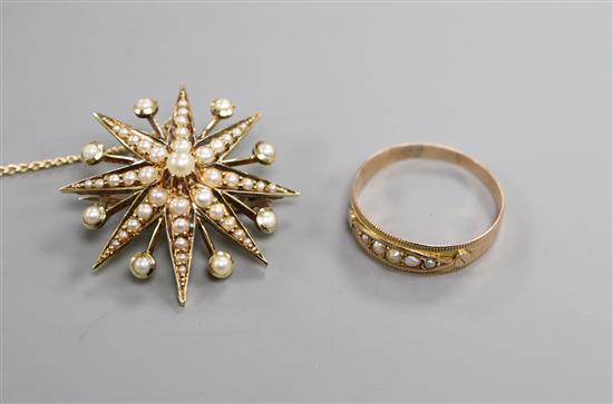 An Edwardian 15ct and seed pearl set starburst brooch and a Victorian 9ct and seed pearl ring.